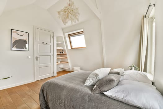 Spacious interior featuring neutral tones, large windows, and minimalist decor elements creating a calming atmosphere.