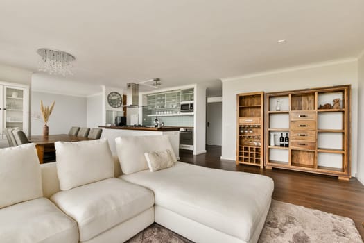 A contemporary living room showcasing a cozy seating area, elegant decor, and vibrant elements, perfect for relaxation and entertainment.