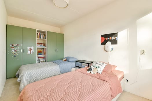 A well-organized children's bedroom featuring light colors and playful decor, inviting a sense of comfort and creativity.