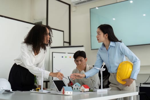 The team tackles sustainable planning challenges, reviewing concepts and models that emphasize eco-friendly initiatives and innovative technologies in their designs.