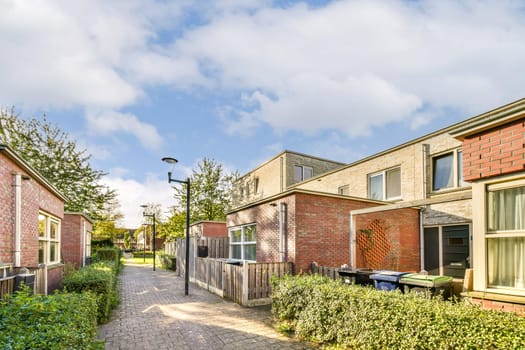 A picturesque view of a residential street showcasing modern architecture, vibrant trees, and bright skies, perfect for suburban aesthetics.