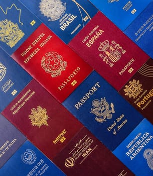 Passports of citizens of different countries of the world, background consisting of passports of several countries.