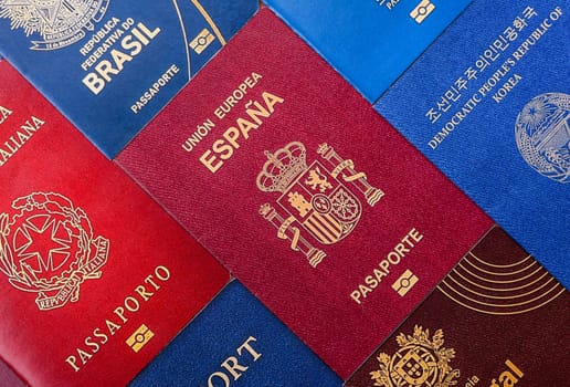 Passports of citizens of different countries of the world, background consisting of passports of several countries.