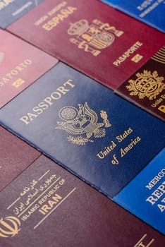 Passports of citizens of different countries of the world, background consisting of passports of several countries.