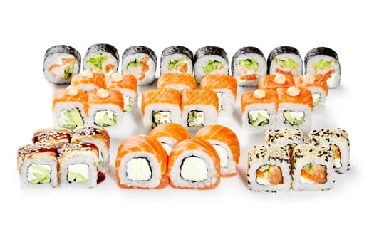 Sushi assortment featuring salmon, avocado, cream cheese, and sesame seeds, creating a visually appealing culinary experience