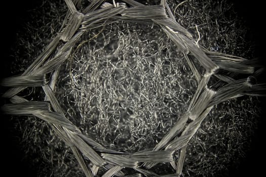 Intricate microscopic image revealing the detailed structure of fabric fibers, emphasizing their texture and composition.