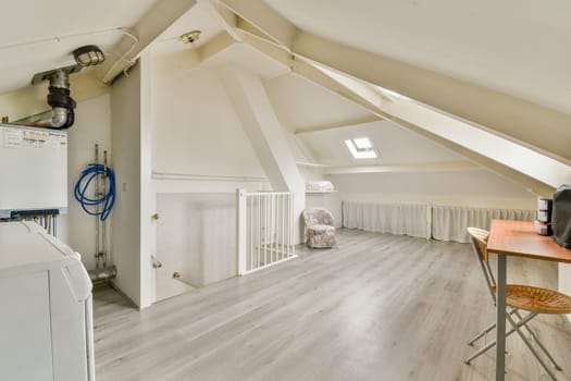 Bright, modern indoor space featuring a laundry area complemented by stylish decor and a calming atmosphere for a comfortable living experience.
