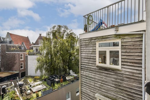 A vibrant rooftop scene showcasing lush trees, modern architecture, and a clear blue sky, perfect for urban relaxation and nature appreciation.