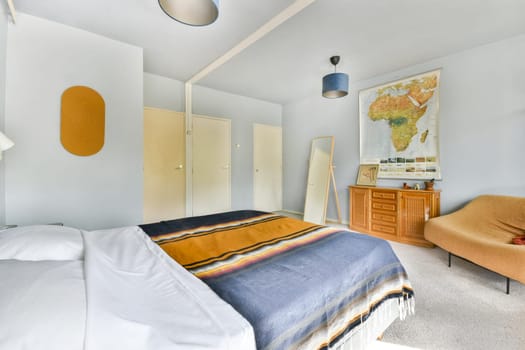 A stylish bedroom featuring a warm color palette, cozy textiles, and modern furniture that creates a welcoming atmosphere.
