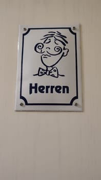 October 17 2024 Bad Schandau Germany Europe - Bathroom sign men toilet room indoor furniture house hotel apartment building architecture travel tourism shotlisttravel place destination objects
