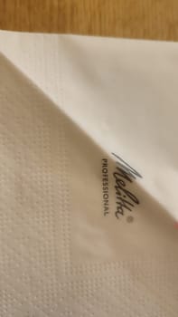 October 17 2024 Bad Schandau Germany Europe Napkin Melitta Professional cafe bar restaurant sign logo editorial shotlisttravel travel tourism objects High quality photo design decor white background