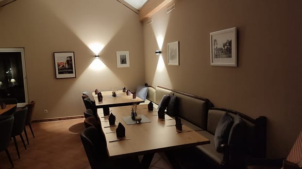 October 17 2024 Bad Schandau Germany Europe Cozy dining area cafe restaurant objects furniture shotlisttravel travel tourism place destination indoor house hotel wooden table editorial design interior . High quality photo