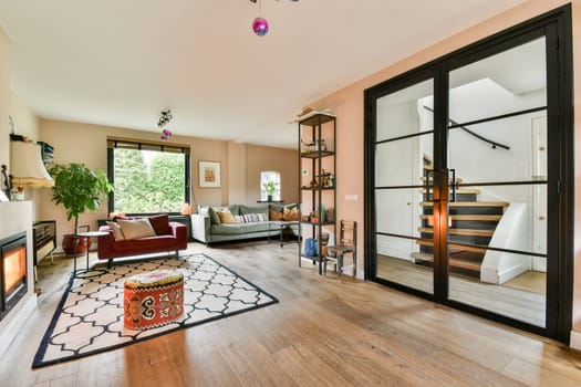 A beautifully designed modern living room featuring cozy furniture, warm lighting, and an inviting atmosphere, perfect for relaxation and socializing.
