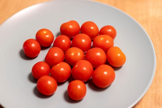 Cherry tomatoes on the ceramic plate