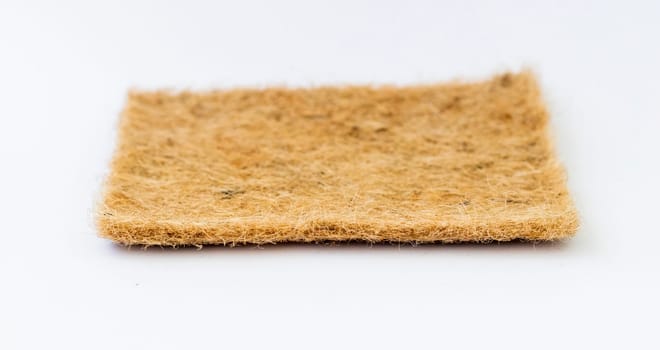 Close up shot of the jute mat used for growing micro greens on the white background