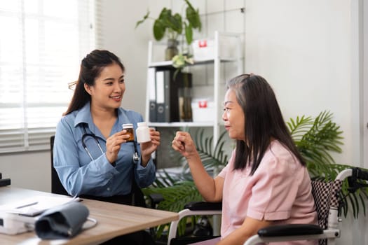 In a warm healthcare setting, a nurse collaborates with an elderly patient, highlighting medication details and encouraging a positive health journey.