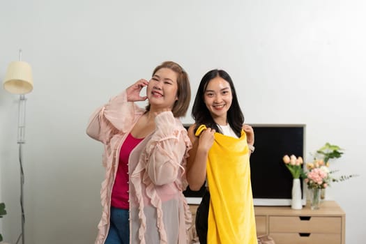Amidst a playful moment, these friends pose with enthusiasm, embodying the joy of friendship and the excitement of sharing fashion together.