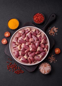 Chicken raw heart, red duck or turkey internal organs as an ingredient for dinner preparation
