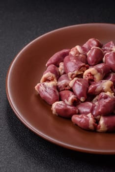 Chicken raw heart, red duck or turkey internal organs as an ingredient for dinner preparation