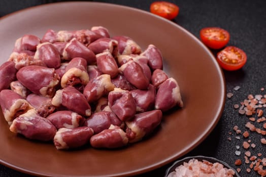 Chicken raw heart, red duck or turkey internal organs as an ingredient for dinner preparation