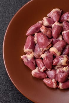 Chicken raw heart, red duck or turkey internal organs as an ingredient for dinner preparation