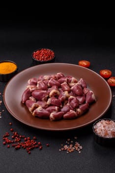 Chicken raw heart, red duck or turkey internal organs as an ingredient for dinner preparation