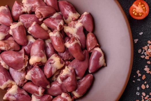 Chicken raw heart, red duck or turkey internal organs as an ingredient for dinner preparation