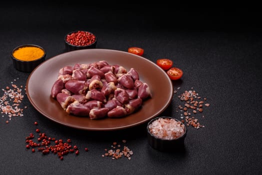 Chicken raw heart, red duck or turkey internal organs as an ingredient for dinner preparation