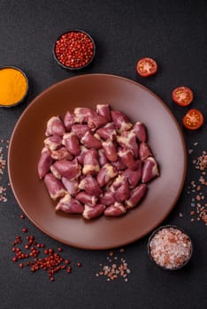 Chicken raw heart, red duck or turkey internal organs as an ingredient for dinner preparation