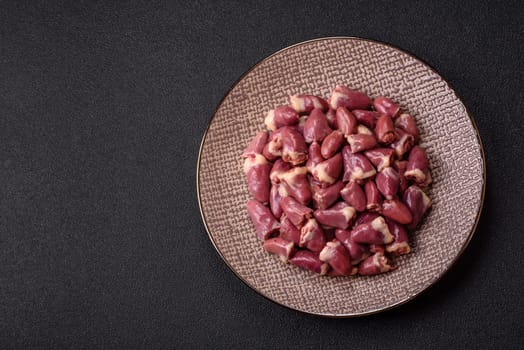 Chicken raw heart, red duck or turkey internal organs as an ingredient for dinner preparation