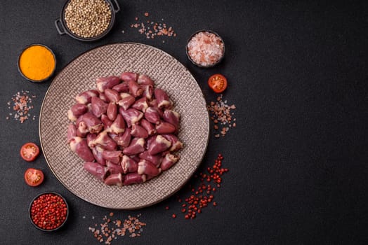 Chicken raw heart, red duck or turkey internal organs as an ingredient for dinner preparation