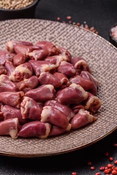 Chicken raw heart, red duck or turkey internal organs as an ingredient for dinner preparation