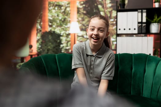 Adolescent girl facing mental health struggles in a therapy session, social issues. Therapist providing support and helping her improve self esteem, manage internal frustration.
