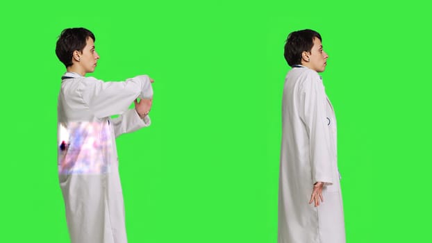 General practitioner doing timeout symbol and i dont know sign in studio, acting clueless and asking for a break against greenscreen backdrop. Woman medic wears white coat. Camera B.