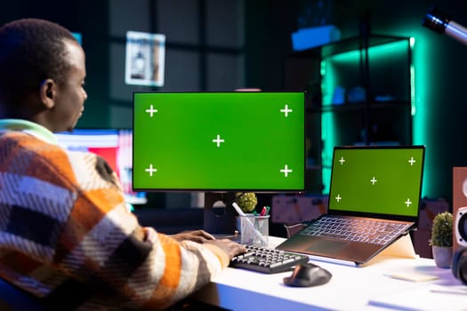 Legal expert analyzing capital funds documents at home with copy space mockup, working with monthly earnings balance. African american accountant checking economic strategy to increase revenue.