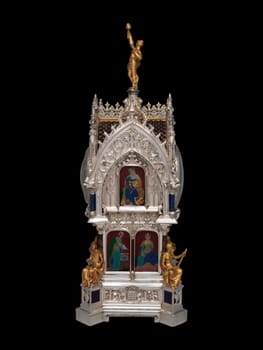 This magnificent antique table clock with calendar, crafted by Lucien Falize in 1881, features intricate silver and gold detailing in a striking gothic design. Its opulent craftsmanship adds timeless luxury to vintage decor collections.