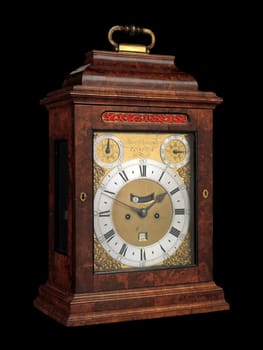 This elegant antique bracket clock with calendar, crafted by Daniel Delander around 1720, features rich wooden craftsmanship and intricate detailing. Its baroque design adds timeless sophistication to vintage decor collections.