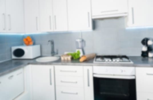 Kitchen Countertop Blurred In A Light, Modern Kitchen, Out Of Focus