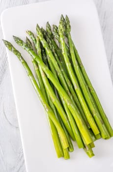 Slender stalks shine with moisture, each bright green spear cooked to perfect tenderness