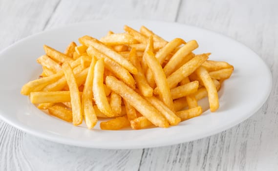 Crisp edges and golden glow highlight the irresistible simplicity of classic fries