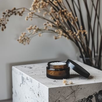 Cosmetic cream in a glass jar. Skin care concept. Background for beauty products