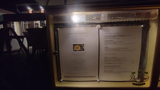 October 17 2024 Bad Schandau Germany Europe Restaurant menu display food shop shopping shotlisttravel travel tourism night light paper information editorial . High quality photo