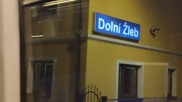 October 17 2024 Dolni Zleb Czech Republic Europe Train station sign building yellow architecture street windows door night travel tourism transport shotlisttravel outdoor photo editorial
