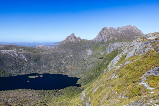 The view of mountain landscape from Marions Lookout over Dove Lake towards Hansons Peak and Cradle Mountain on a warm autumn morning in Cradle Mountain, Tasmania, Australia