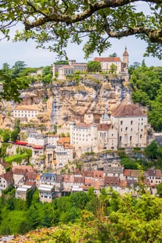 Rocamadour, the medieval village perched on a steep cliff over the Alzou valley, attracts numerous pilgrims and tourists in France