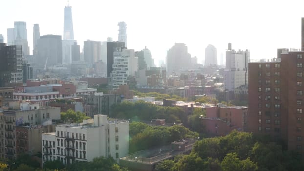 New York City, United States - 7 Sept 2023: Manhattan skyline cityscape. Rooftop view point, residential district buildings roofs. World trade center. Lower East Side and Downtown financial district.