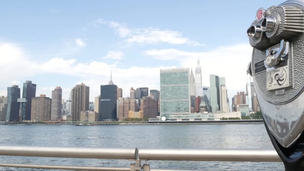 New York City, United States - 4 Sept 2023: Waterfront skyline, Manhattan Midtown, United Nations UN building riverfront skyscraper. Waterside cityscape, tower viewer, Long Island Gantry Plaza, Queens