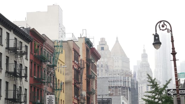 New York City, United States - 8 Sept 2023: Manhattan Soho district Grand and Centre street near Broadway. Urban old classic architecture. Civic Center municipal building, USA Court. Lantern in fog.