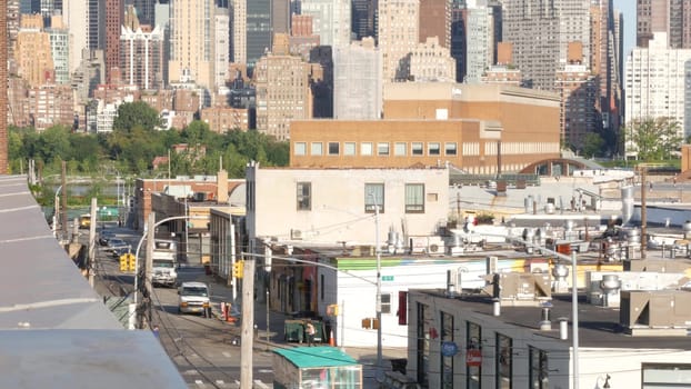 New York City, United States - 2 Sept 2023: Manhattan skyline cityscape. Rooftop view from Queens to Midtown, roof in Long Island. NYC urban architecture, Hunters Point. Residential buildings by river