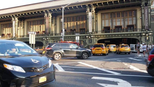 New York City, United States - 4 Sept 2023: Manhattan Downtown Financial District, USA. Road car traffic. Yellow taxi, people. Battery Maritime Building ferry terminal, Whitehall Street. Firefighters.